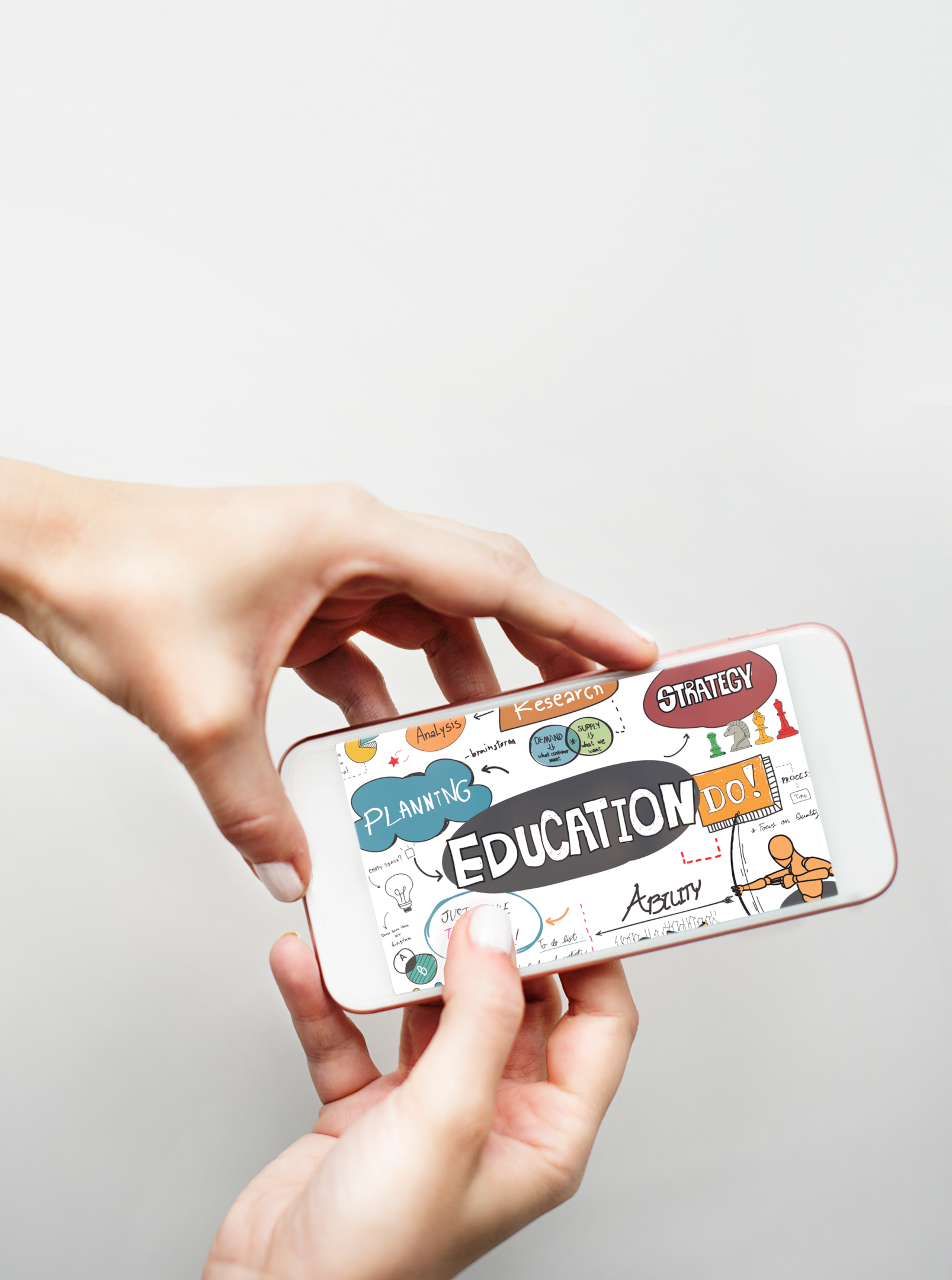 The image depicts a smartphone with a mind map for lifelong learning on its screen